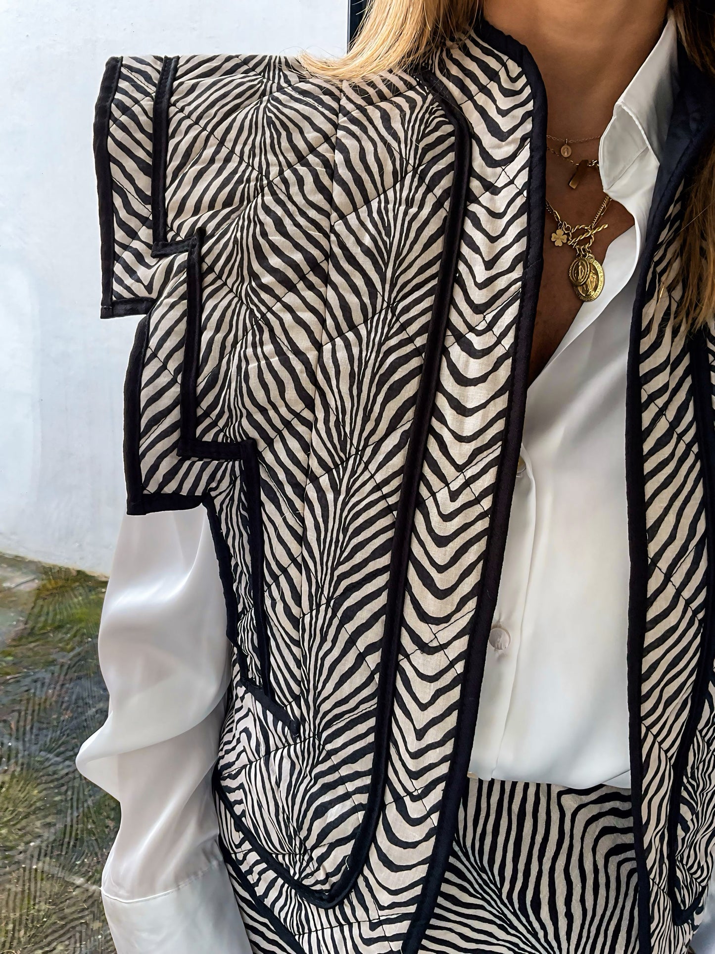 Colete zebra de cor preto