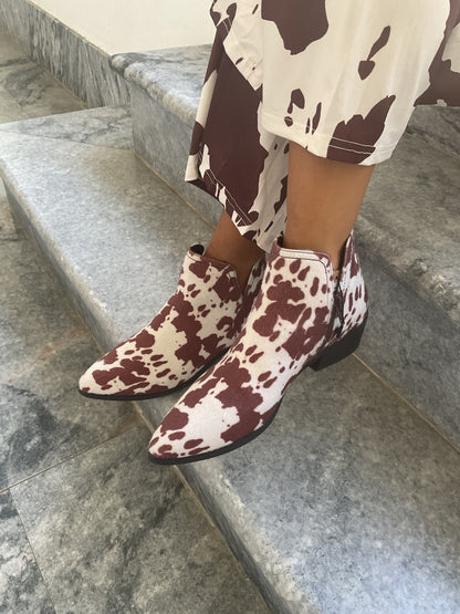 Botim estilo vaca